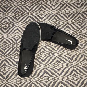 Black sparkly slip-ons